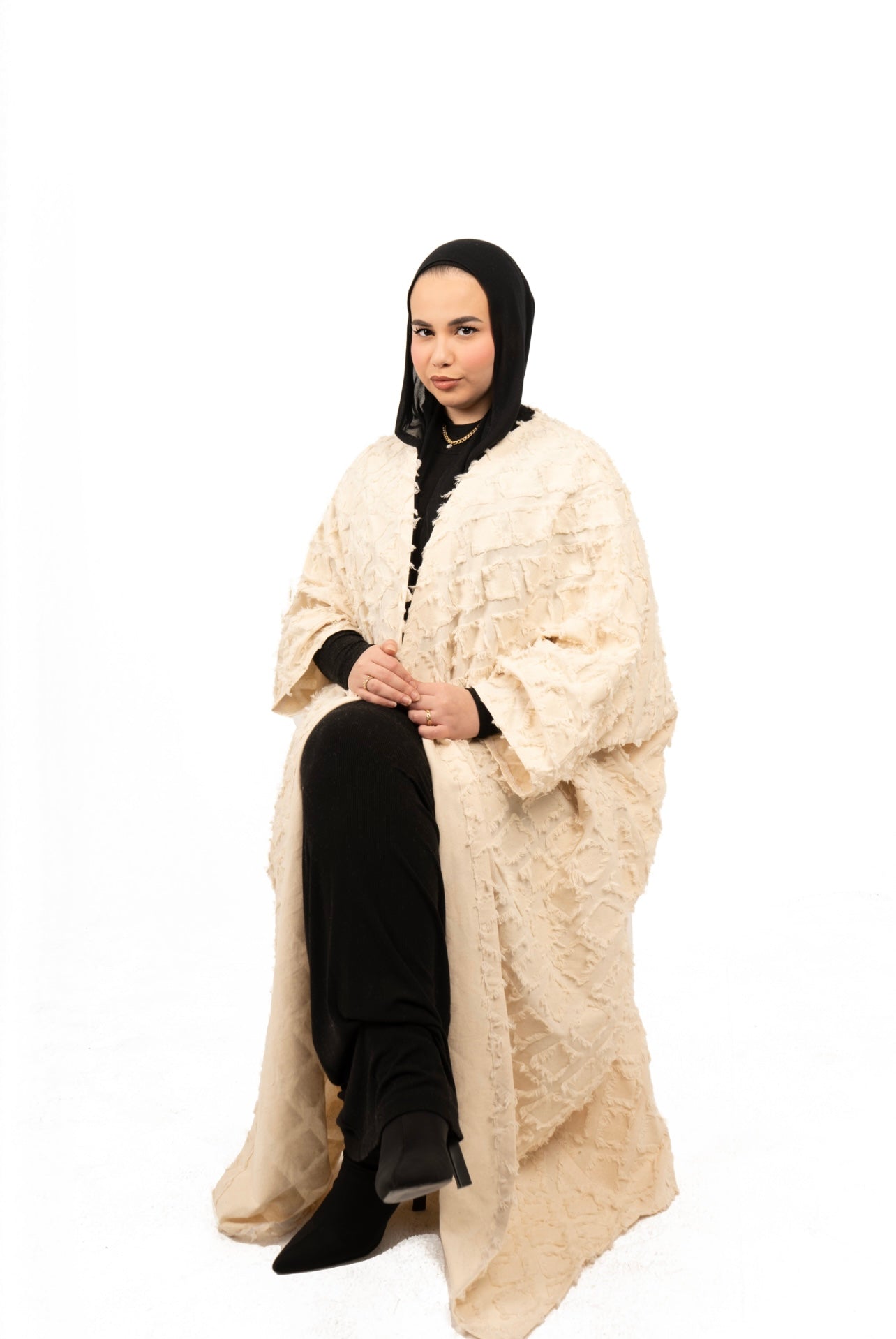 the off-white textured abaya