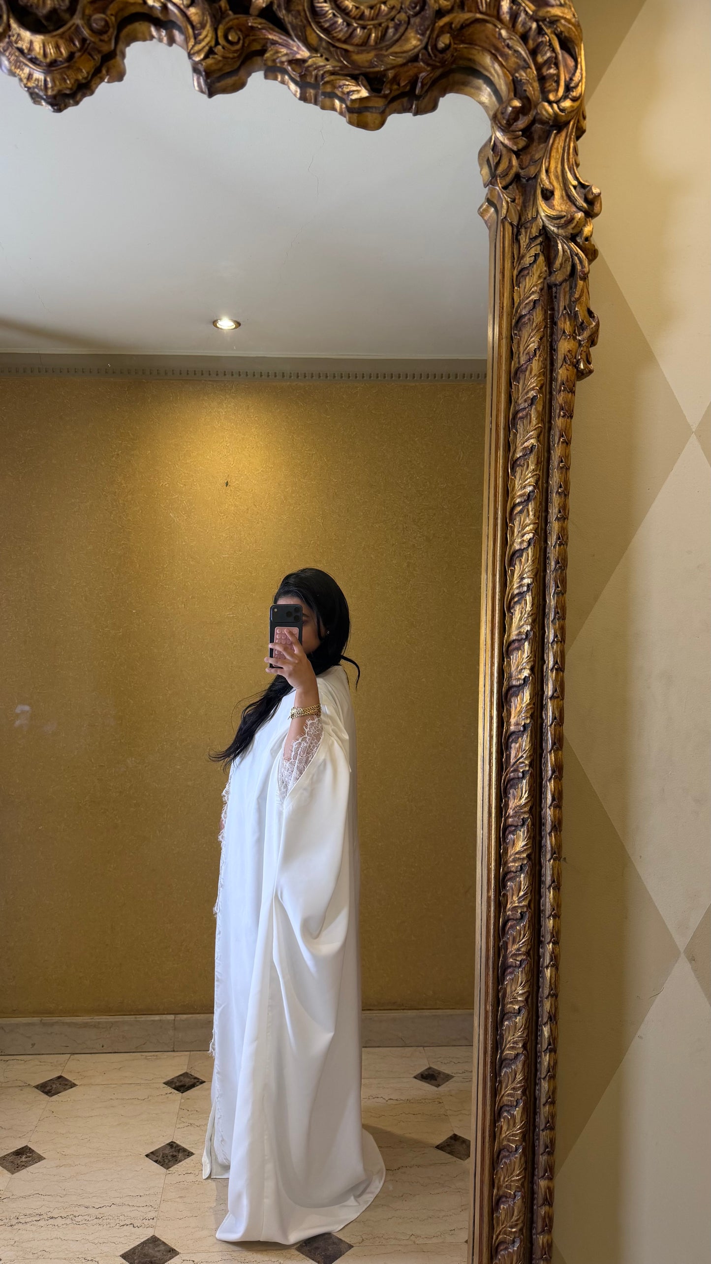 the off-white lace abaya