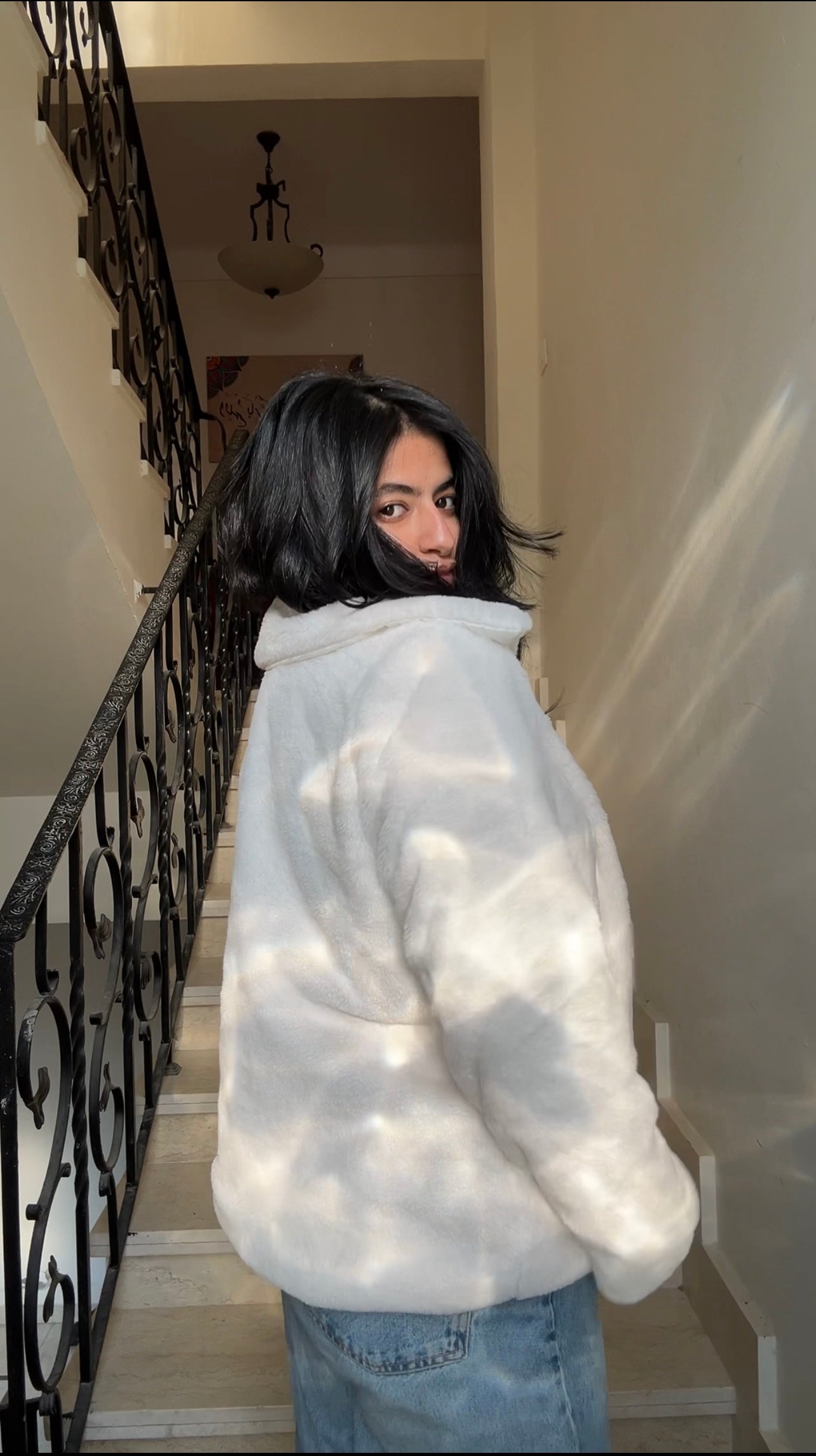 the white fur jacket