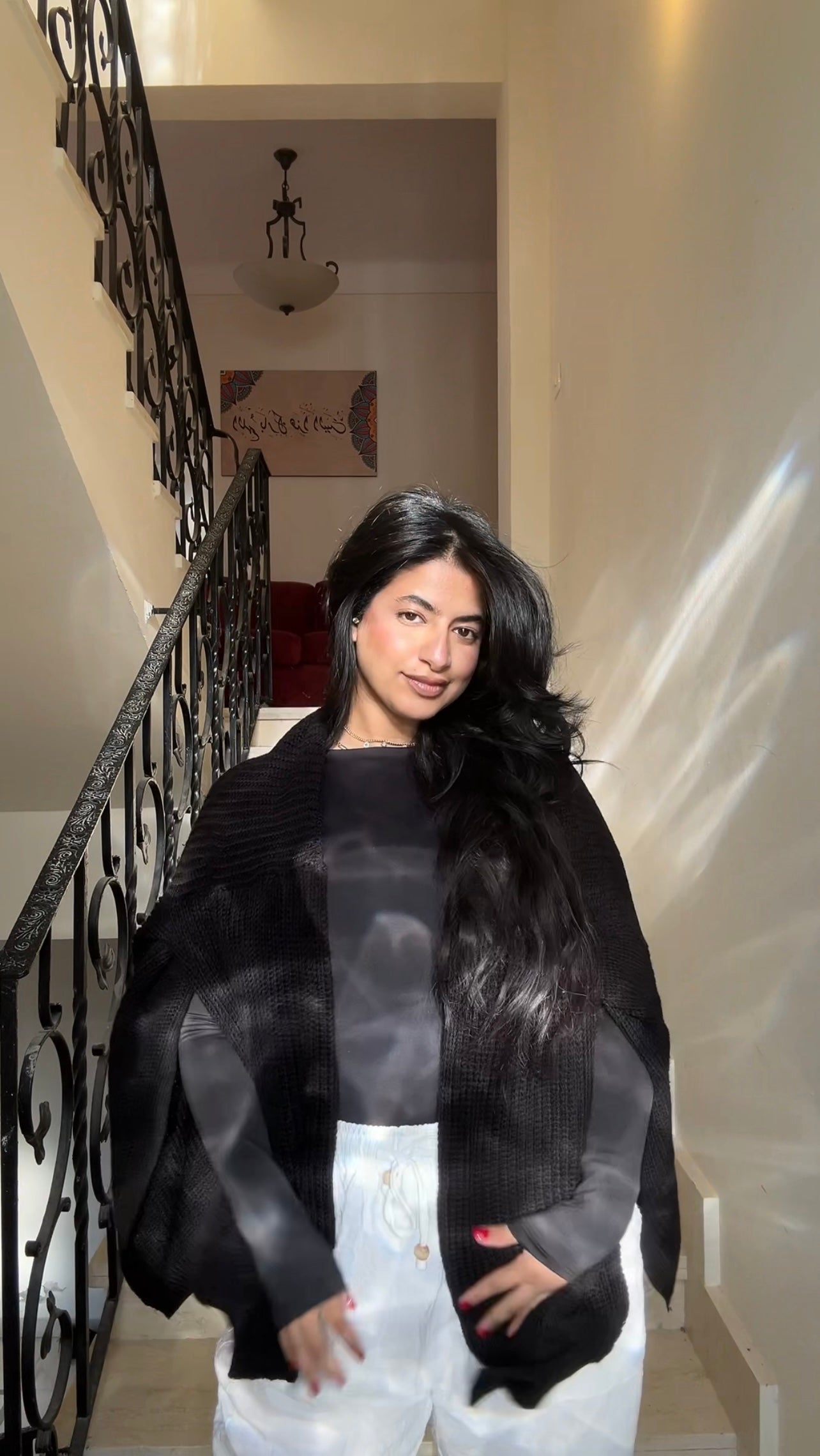 the black short cardigan