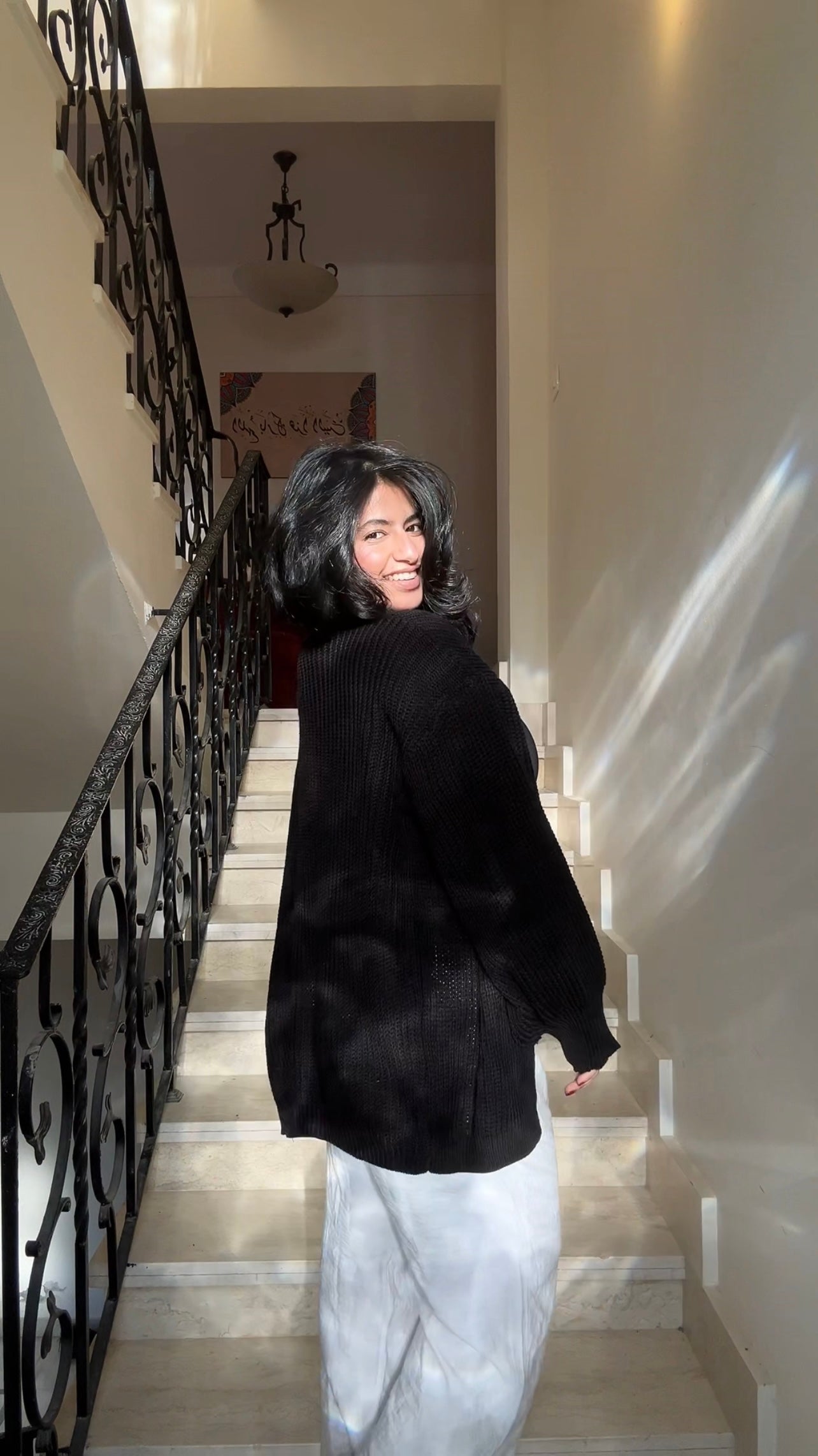 the black short cardigan